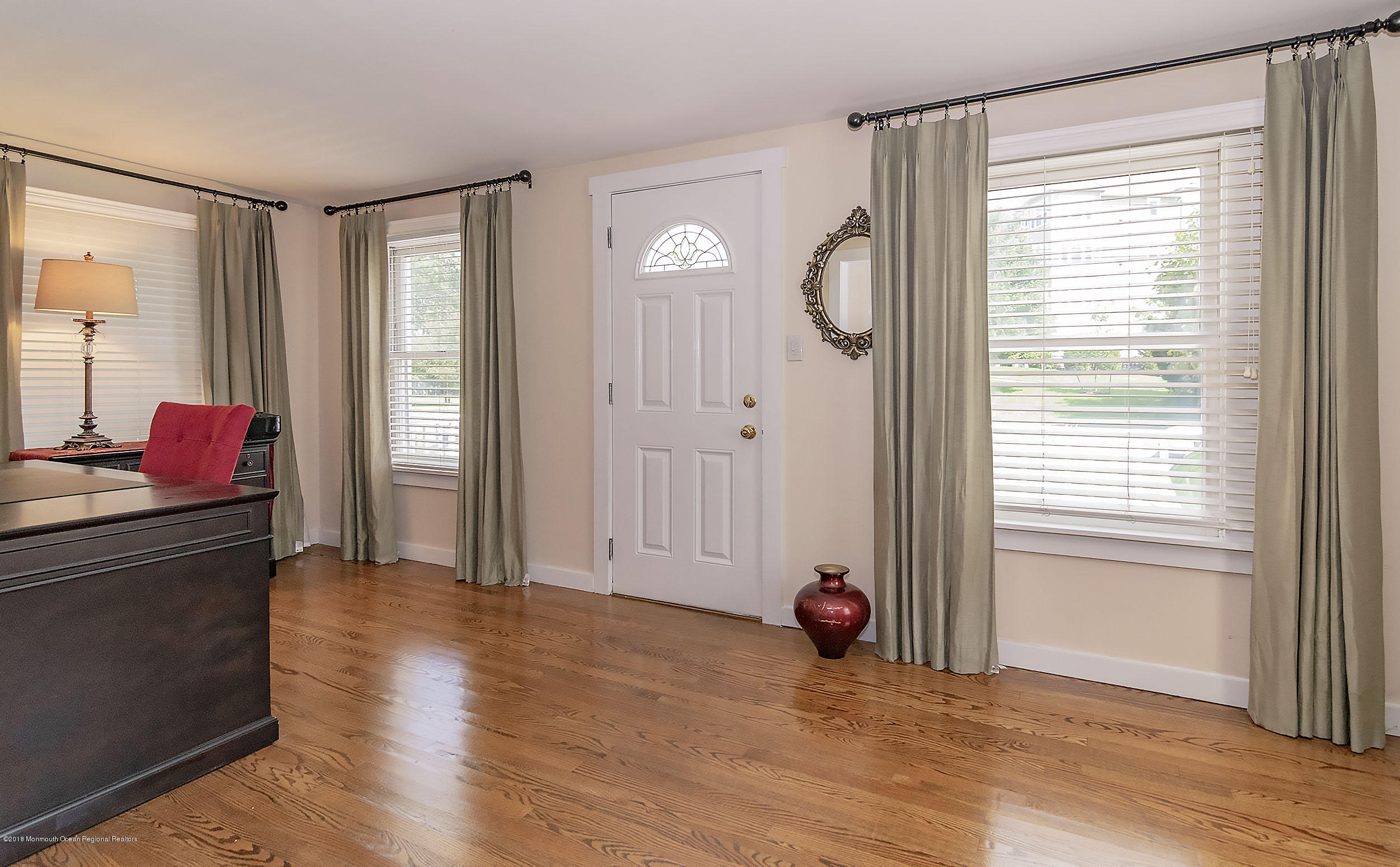 2104 River Road Point Pleasant, NJ 08742 - Photo 18 of 35 a view of livingroom with hardwood floor and a window