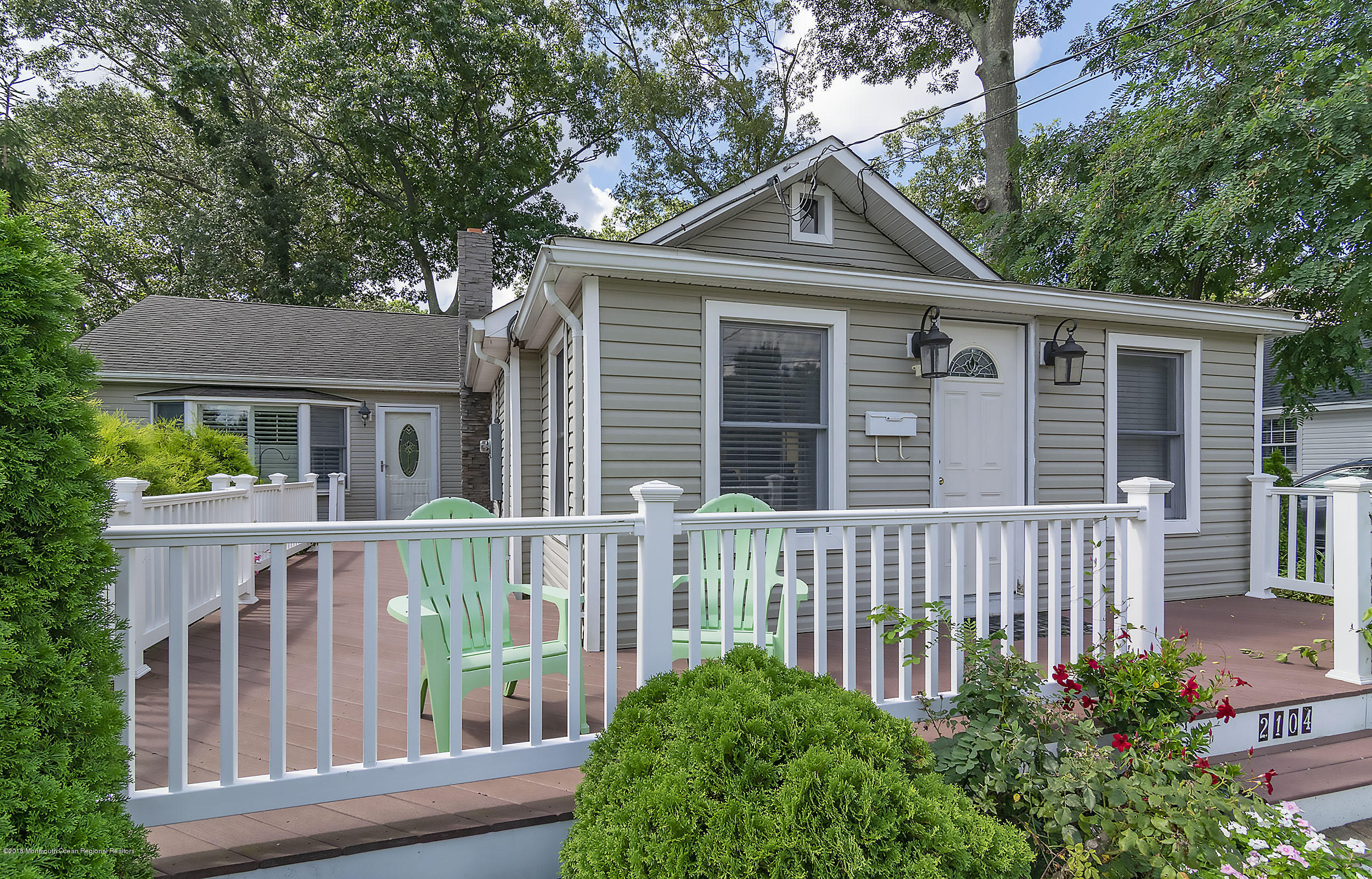 2104 River Road Point Pleasant, NJ 08742 - Photo 2 of 35 a front view of a house with garden
