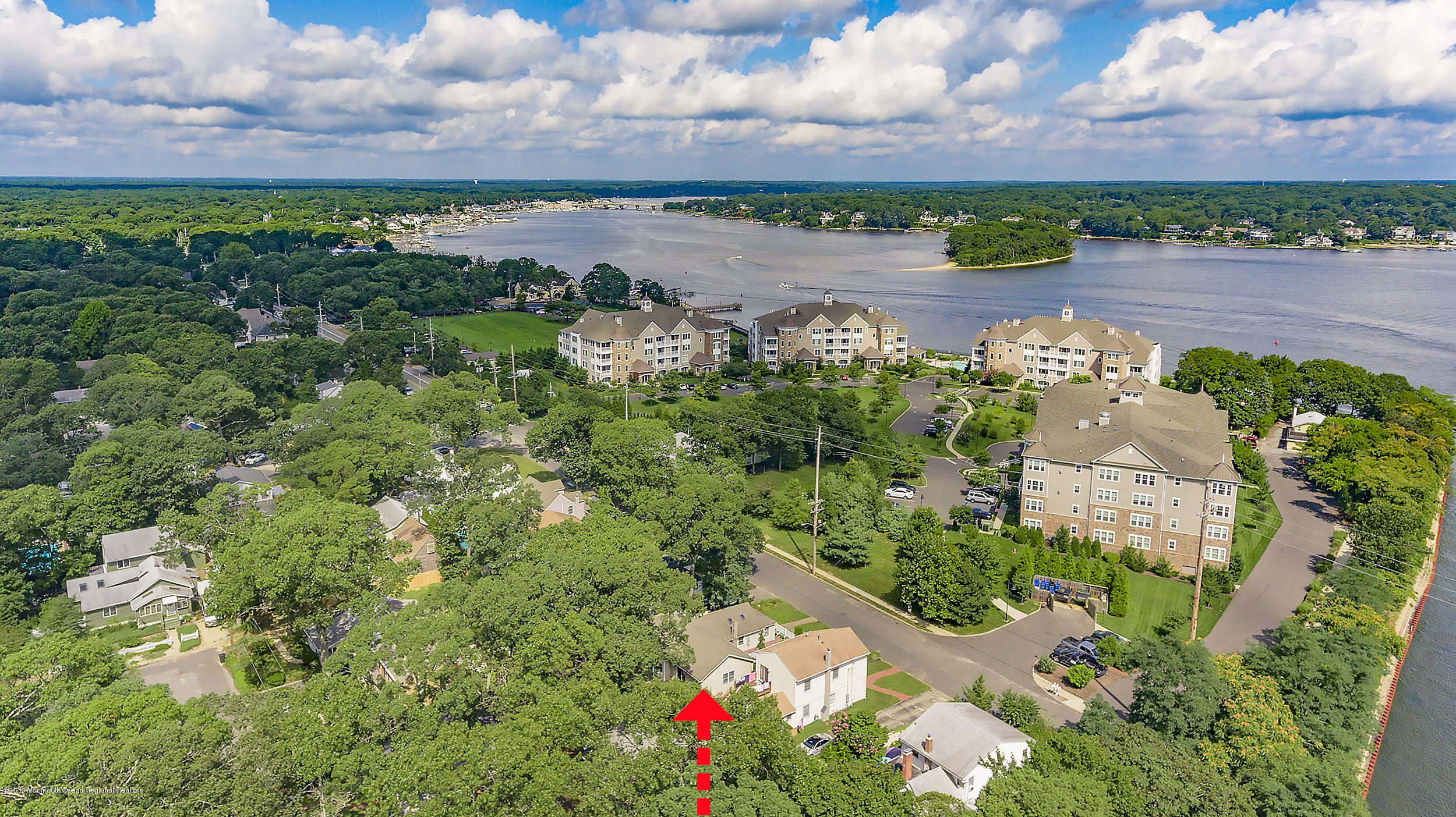 2104 River Road Point Pleasant, NJ 08742 - Photo 3 of 35 a view of a lake with a city