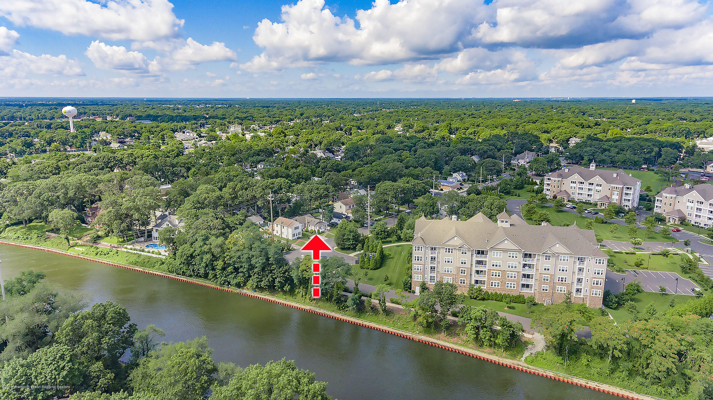 2104 River Road Point Pleasant, NJ 08742 - Photo 32 of 35 an aerial view of a house with a garden and lake view