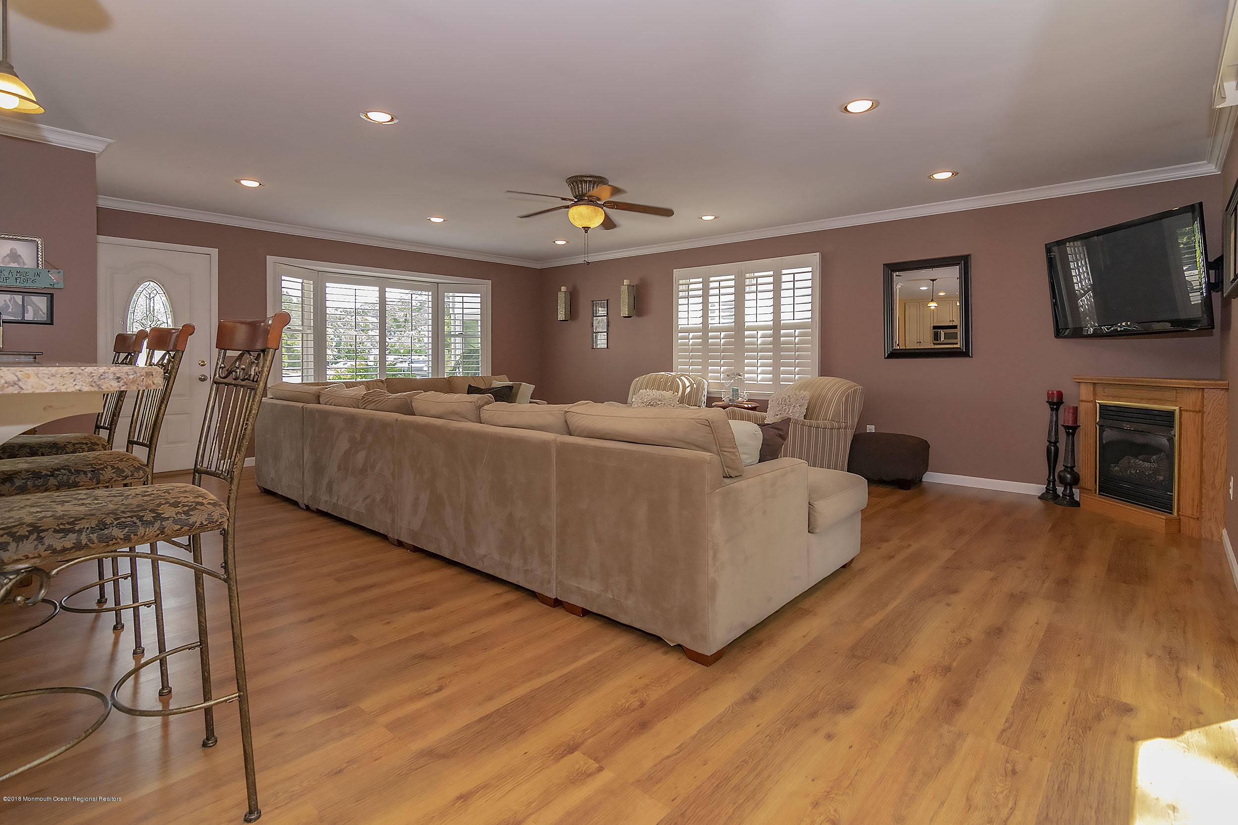 2104 River Road Point Pleasant, NJ 08742 - Photo 4 of 35 a living room with furniture and a flat screen tv
