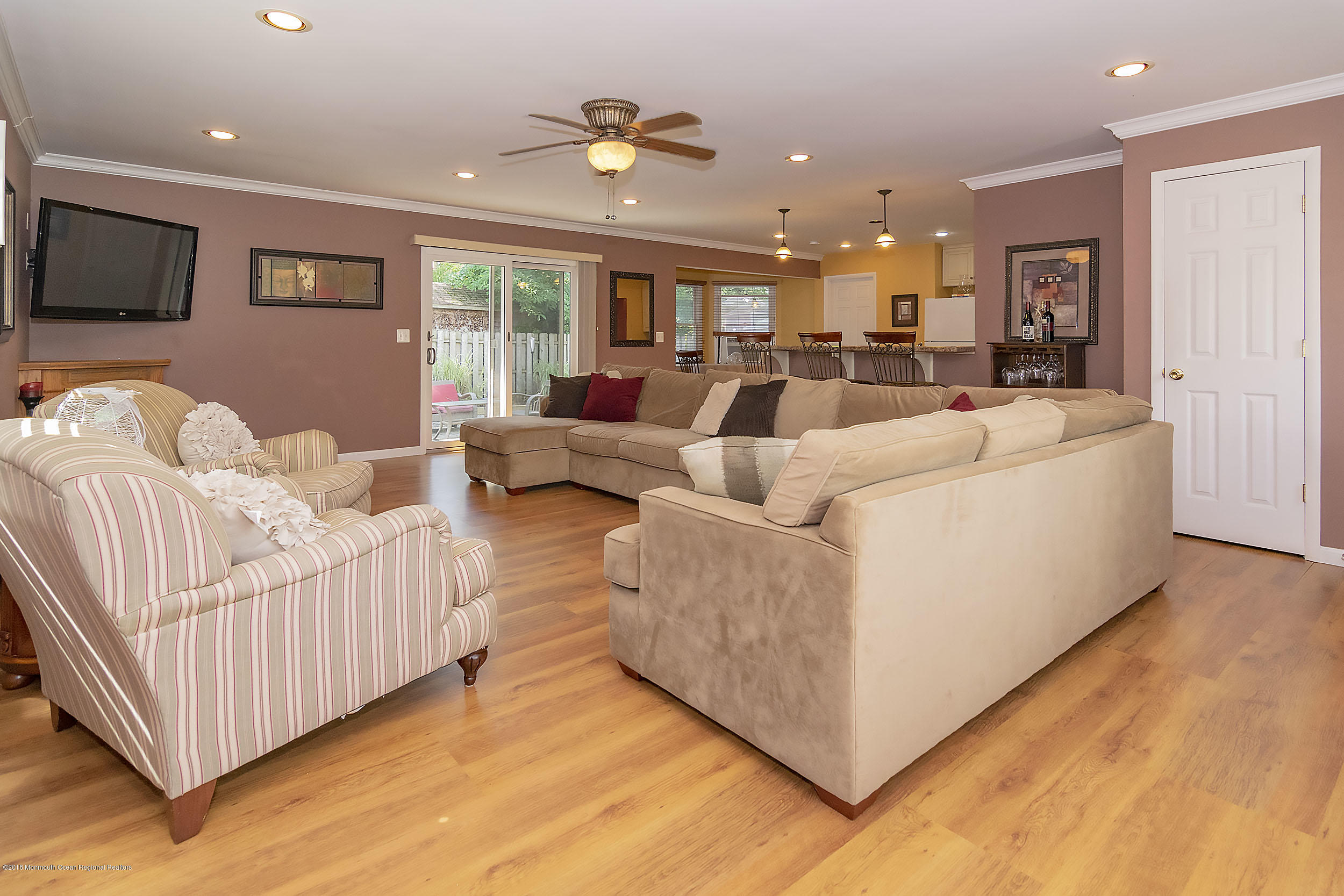 2104 River Road Point Pleasant, NJ 08742 - Photo 6 of 35 a living room with furniture window and a flat screen tv