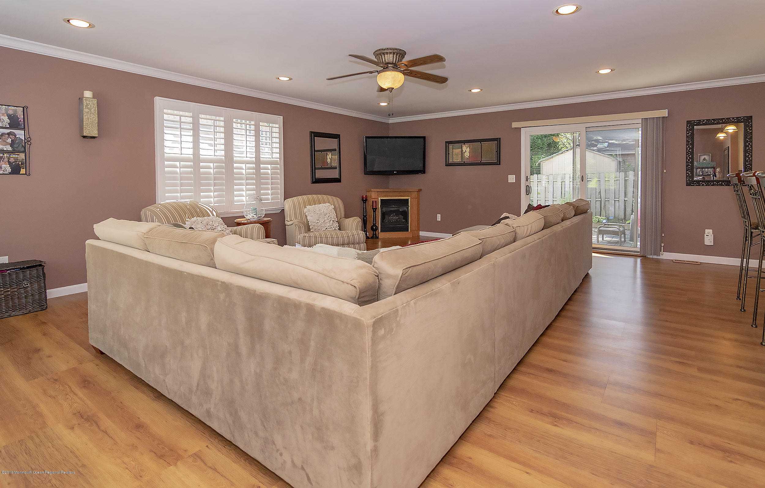 2104 River Road Point Pleasant, NJ 08742 - Photo 8 of 35 a living room with furniture and a flat screen tv