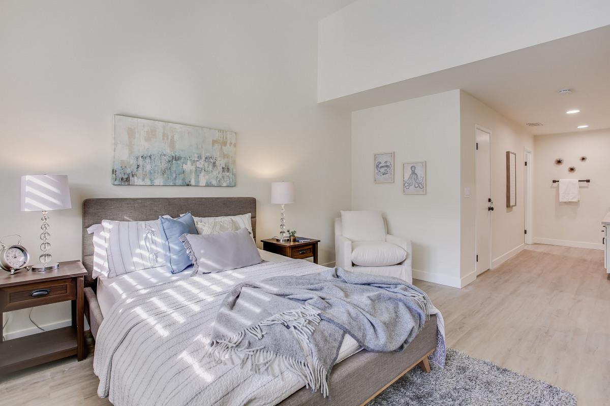 3705 Terstena Place, Unit 201 Santa Clara, CA 95051 - Photo 11 of 25 a bedroom with a bed and painting on the wall