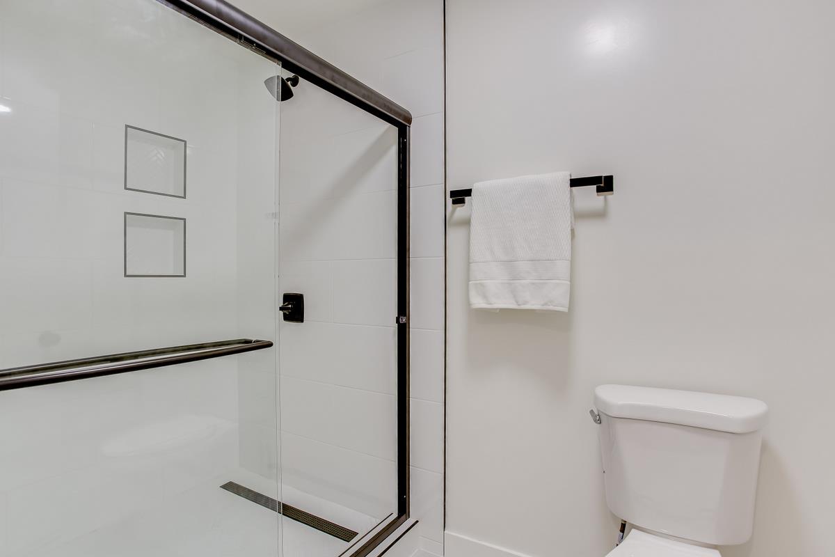3705 Terstena Place, Unit 201 Santa Clara, CA 95051 - Photo 14 of 25 a bathroom with a shower and a toilet