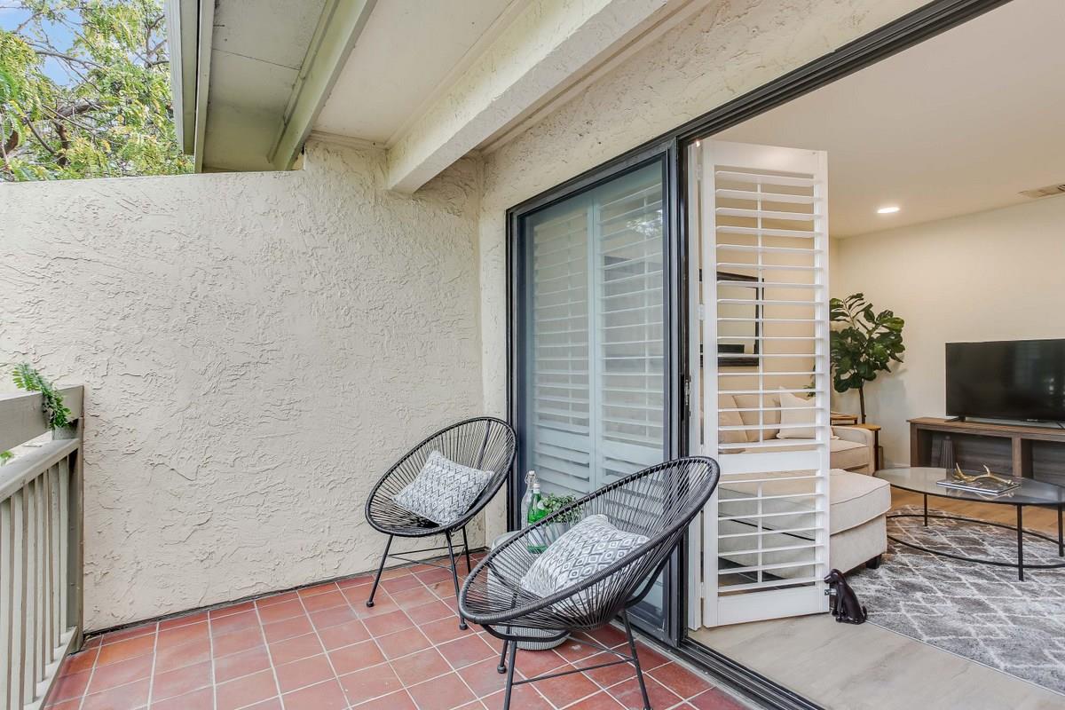 3705 Terstena Place, Unit 201 Santa Clara, CA 95051 - Photo 17 of 25 a living room with furniture and a flat screen tv