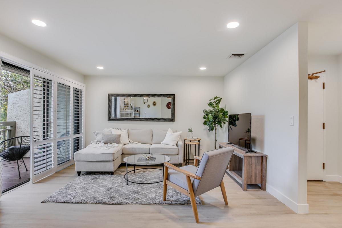 3705 Terstena Place, Unit 201 Santa Clara, CA 95051 - Photo 3 of 25 a living room with furniture and a potted plant