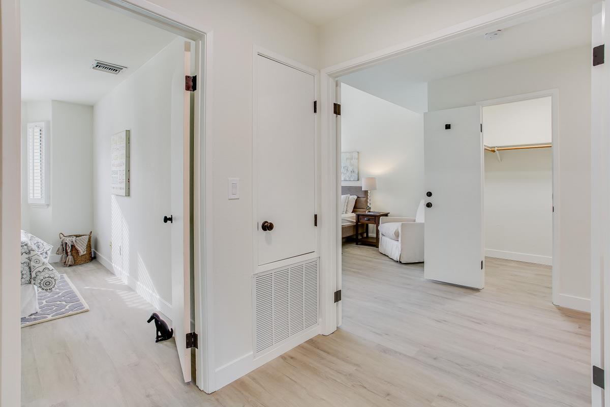 3705 Terstena Place, Unit 201 Santa Clara, CA 95051 - Photo 9 of 25 a view of a room with white furniture and wooden floor