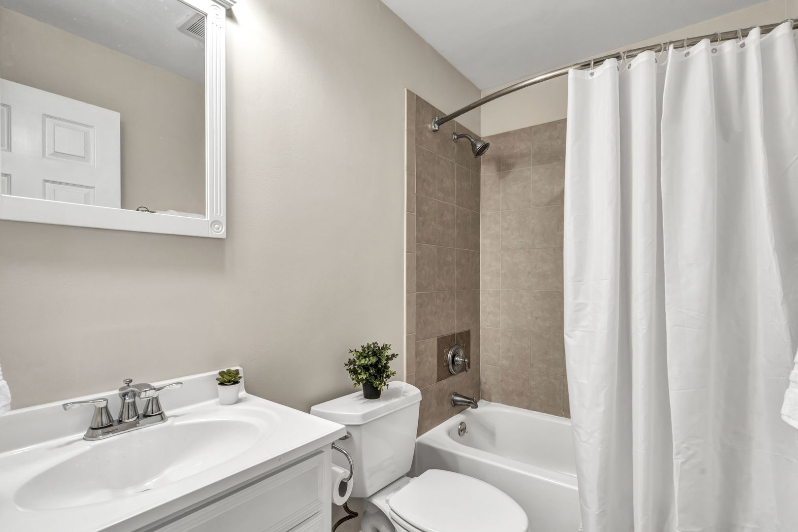 4721 St Joseph Creek Road, Unit 3H Lisle, IL 60532 - Photo 9 of 17 a bathroom with a sink toilet and shower