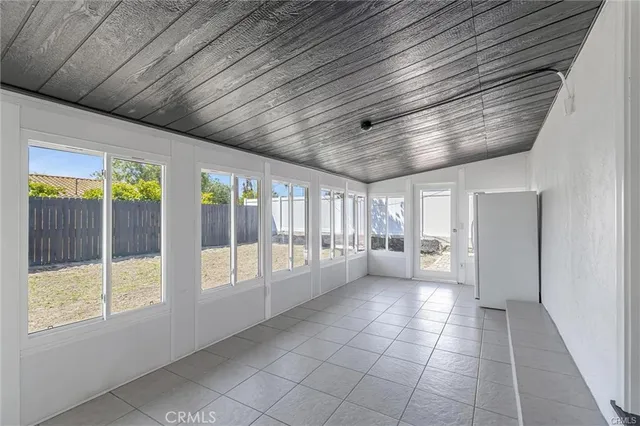 a large space in a hall with a window