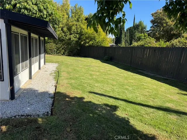 a view of swimming pool from a yard