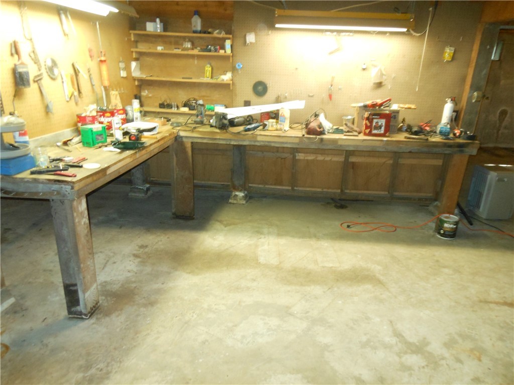 57 Moosup Valley Road Foster, RI 02825 - Photo 38 of 48 WORKSHOP AREA BASEMENT