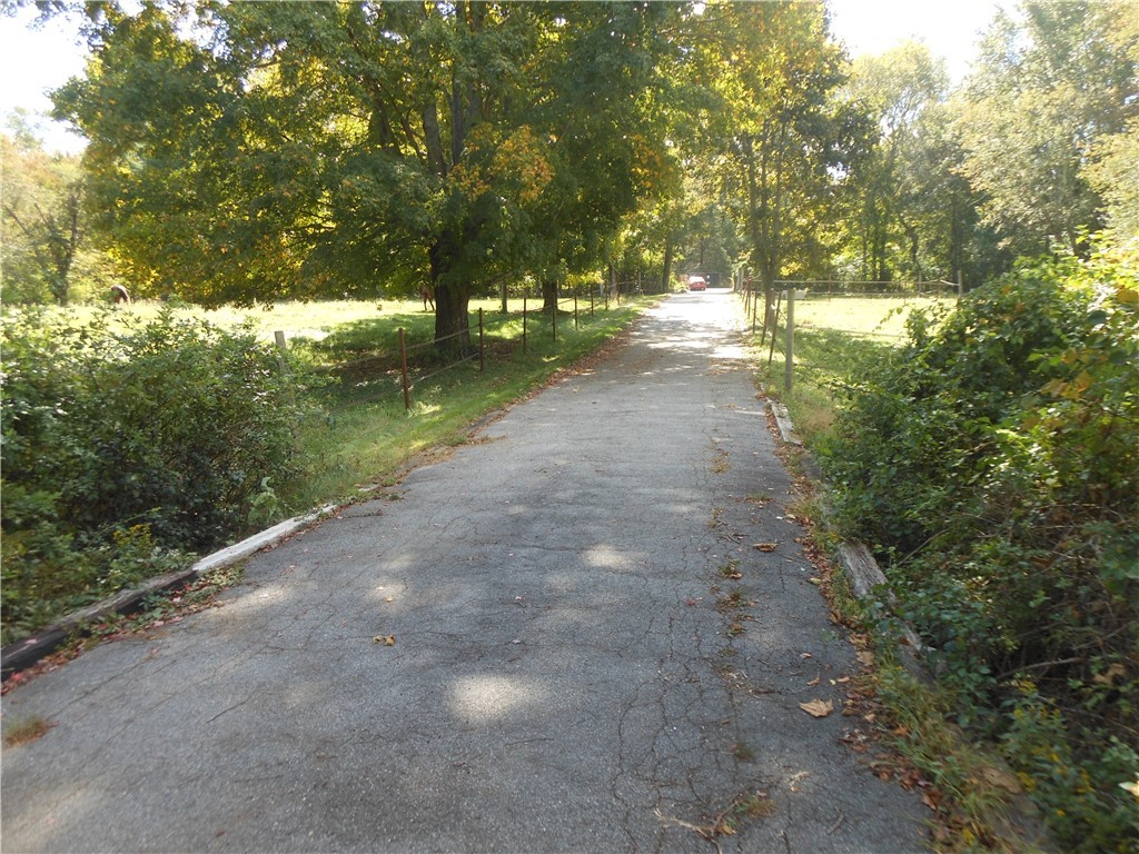 57 Moosup Valley Road Foster, RI 02825 - Photo 48 of 48 DRIVEWAY TO HOME SITUATED NICELY OFF ROAD