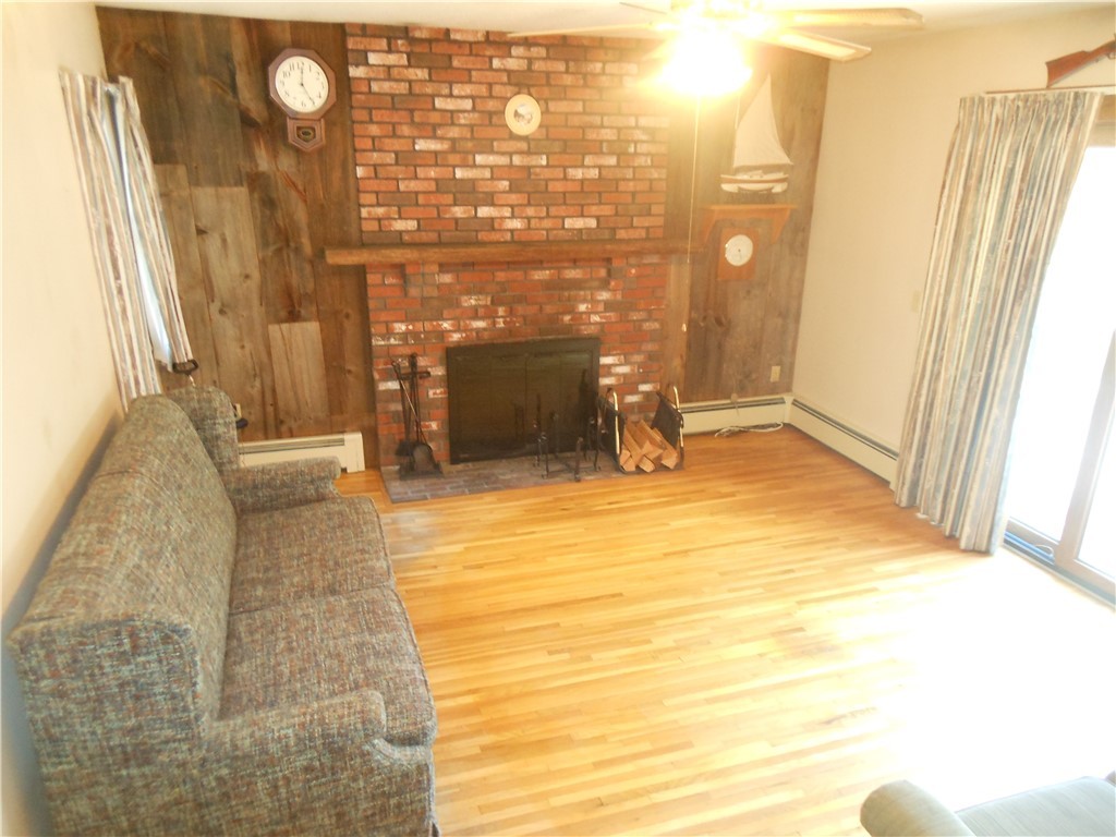 57 Moosup Valley Road Foster, RI 02825 - Photo 5 of 48 FAMILY ROOM WITH FIREPLACE