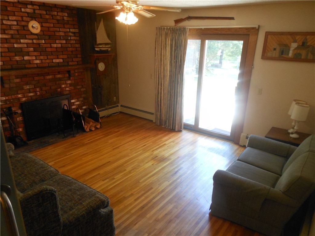 57 Moosup Valley Road Foster, RI 02825 - Photo 6 of 48 FAMILY ROOM WITH FIREPLACE