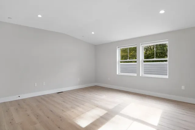 an empty room with windows