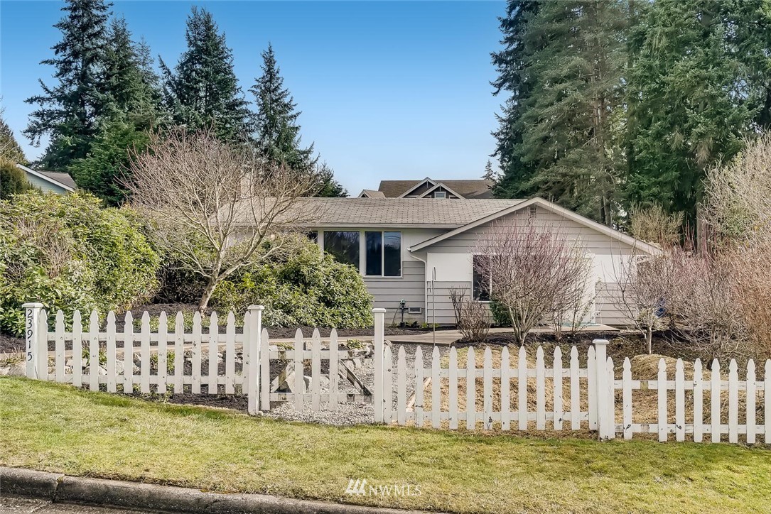 23915 Brier Road Brier, WA 98036 - Photo 1 of 39 a front view of a house with a garden