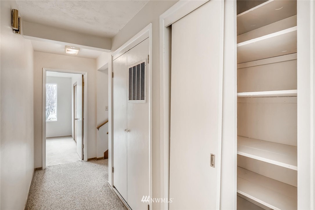 23915 Brier Road Brier, WA 98036 - Photo 12 of 39 a view of a hallway with closet
