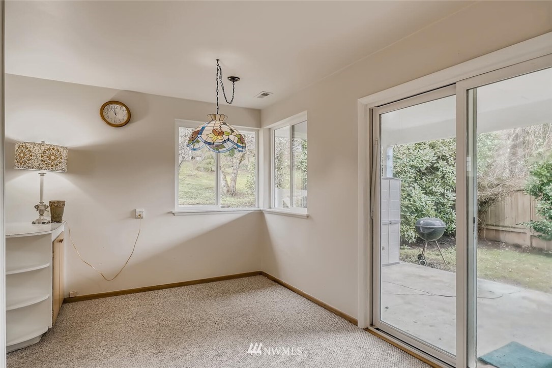 23915 Brier Road Brier, WA 98036 - Photo 19 of 39 a view of an empty room with a window