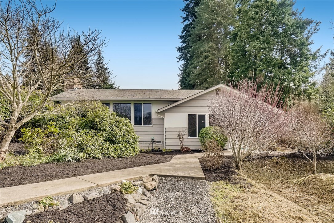 23915 Brier Road Brier, WA 98036 - Photo 3 of 39 a view of a house with a yard and plants