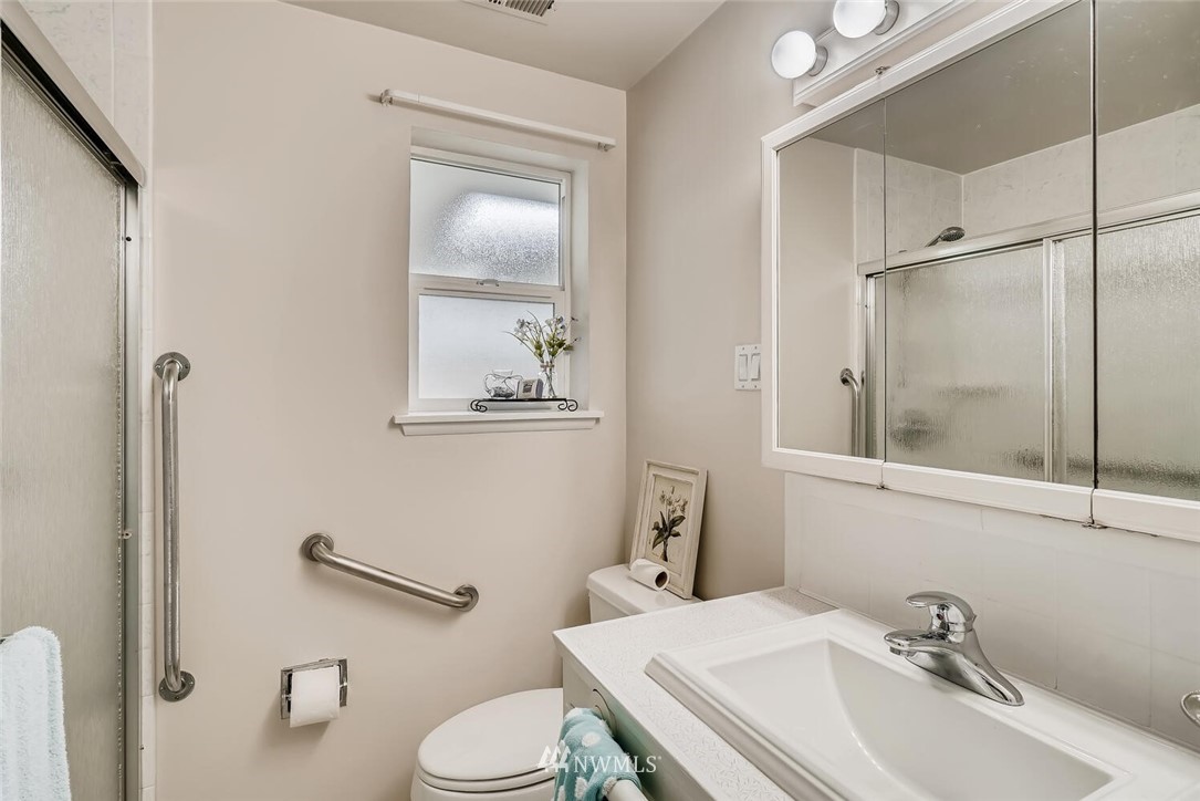 23915 Brier Road Brier, WA 98036 - Photo 26 of 39 a bathroom with a sink toilet and shower