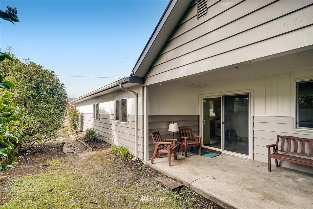 23915 Brier Road Brier, WA 98036 - Photo 32 of 39 a backyard of a house with table and chairs