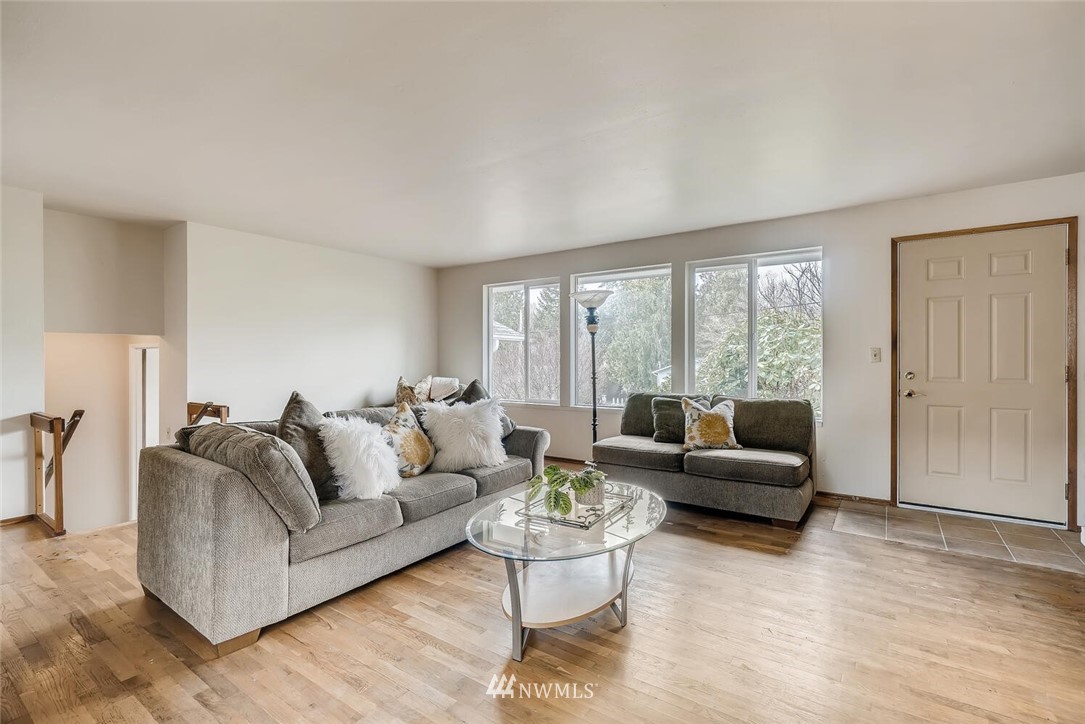 23915 Brier Road Brier, WA 98036 - Photo 6 of 39 a living room with furniture and a large window