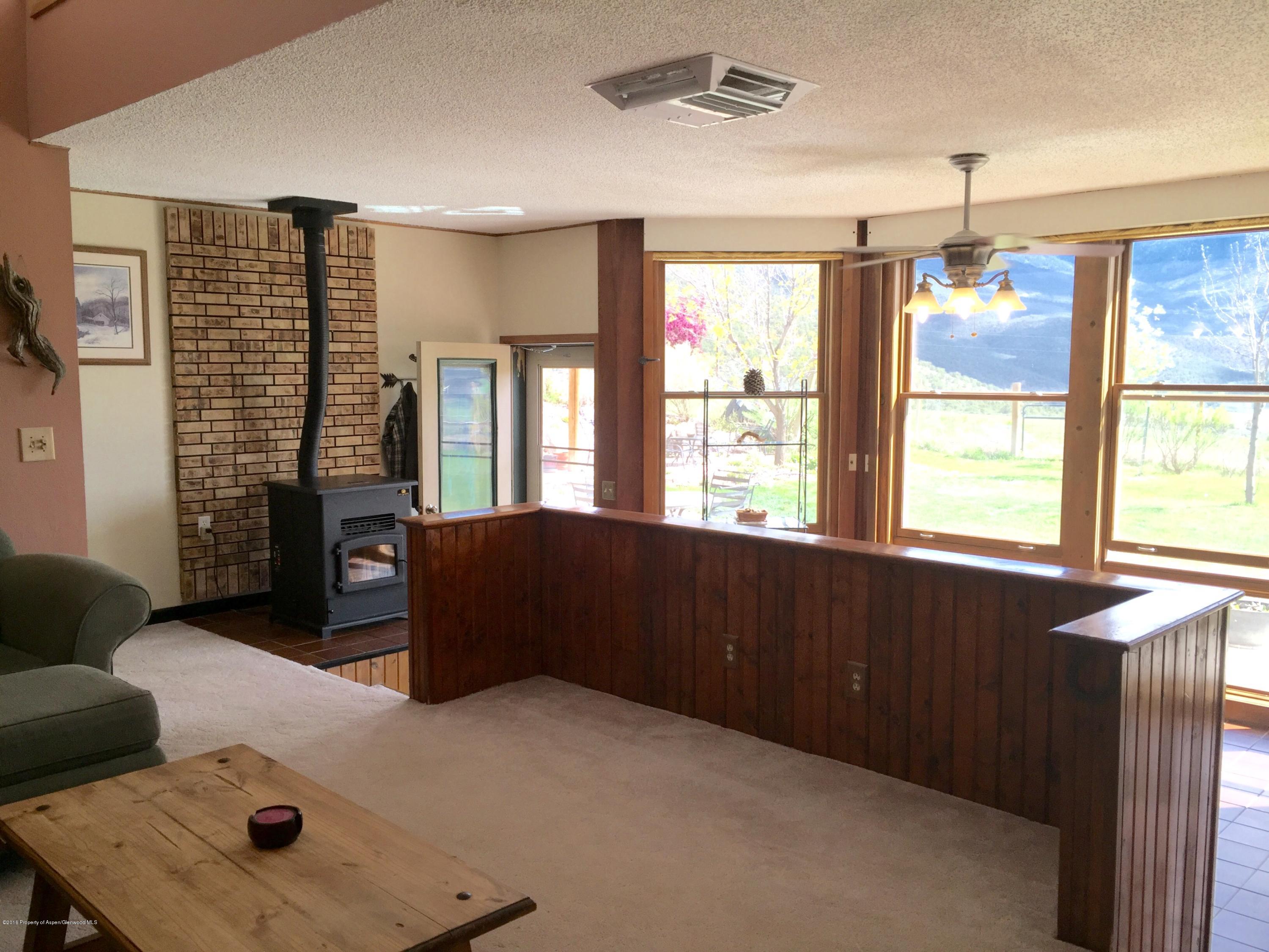 6196 County Road 320 Rifle, CO 81650 - Photo 3 of 42 View from Living Room to West windows