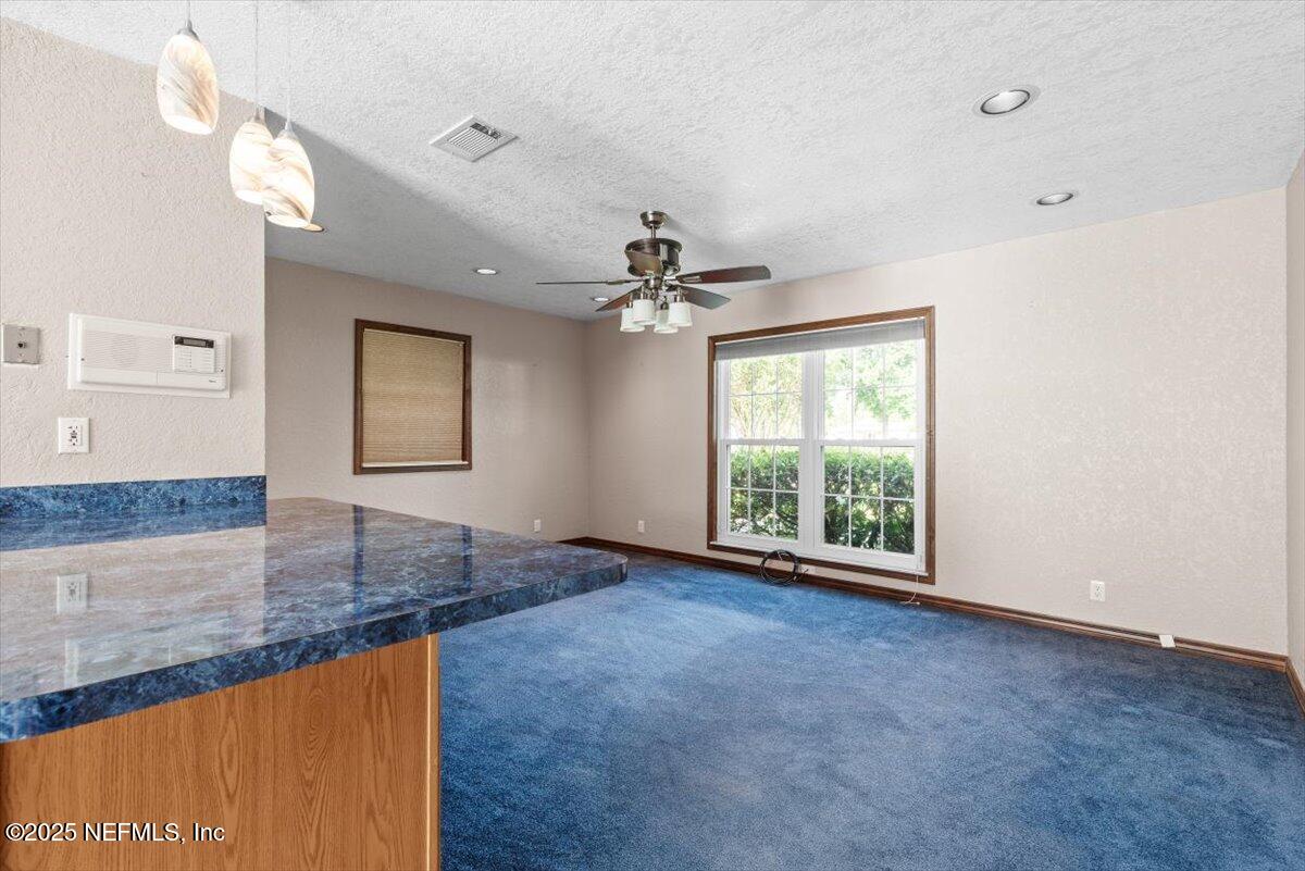 11447 Bridges Road Jacksonville, FL 32218 - Photo 21 of 48 Kitchen into Family Room