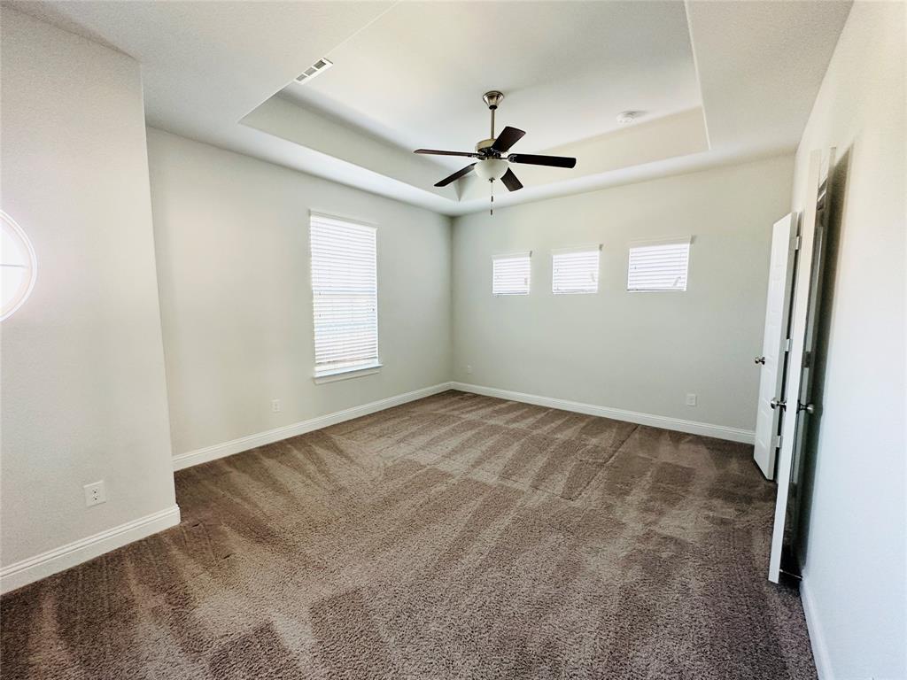 806 Davids Way Allen, TX 75013 - Photo 20 of 24 a view of empty room with ceiling fan