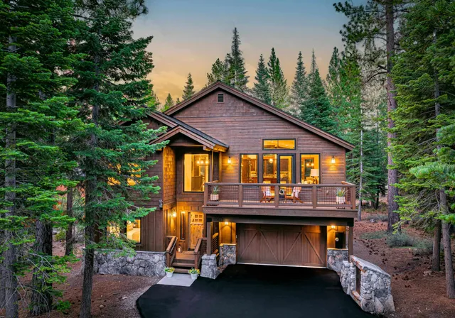 a view of an outdoor sitting area with brick walls