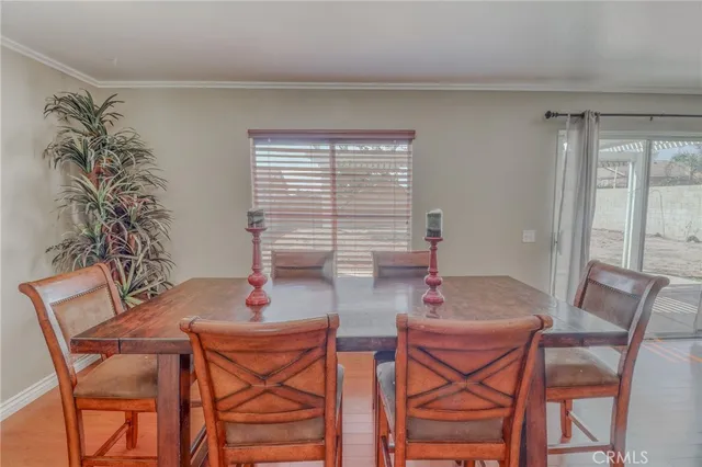 a kitchen with granite countertop a refrigerator stove top oven and sink