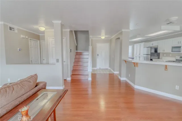 a kitchen with stainless steel appliances granite countertop a sink and cabinets