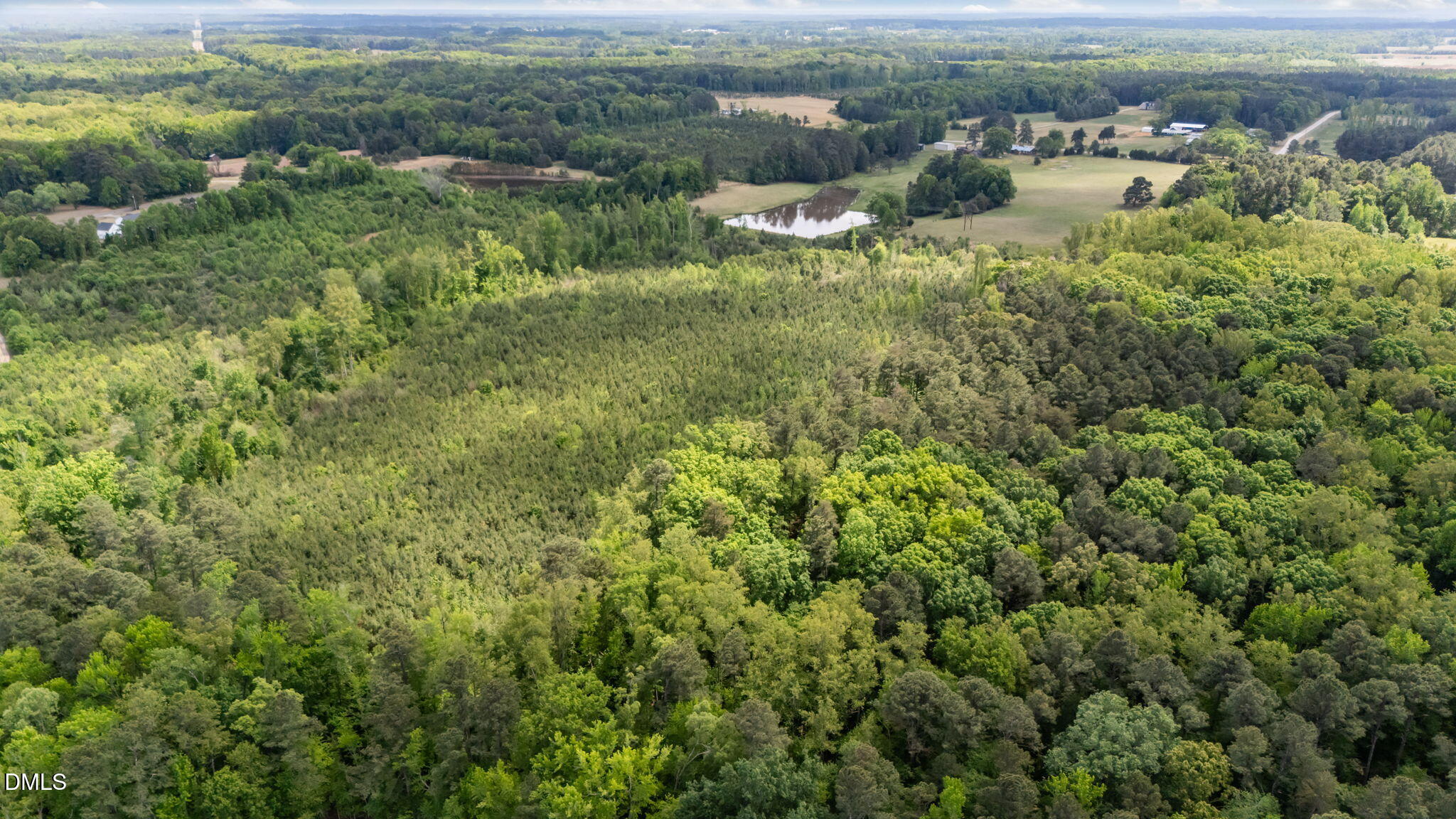 3611 Chewning Road Oxford, NC 27565 - Photo 3 of 45 an aerial view of residential houses with outdoor space and trees