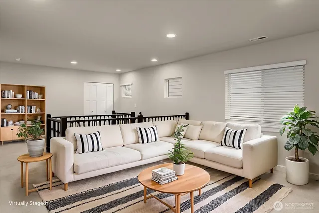 a view of a hallway with windows