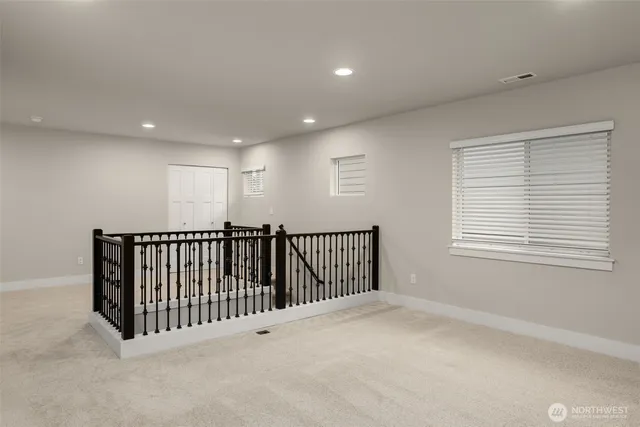 a view of hallway with a window