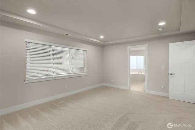 a bathroom with a sink vanity and a mirror