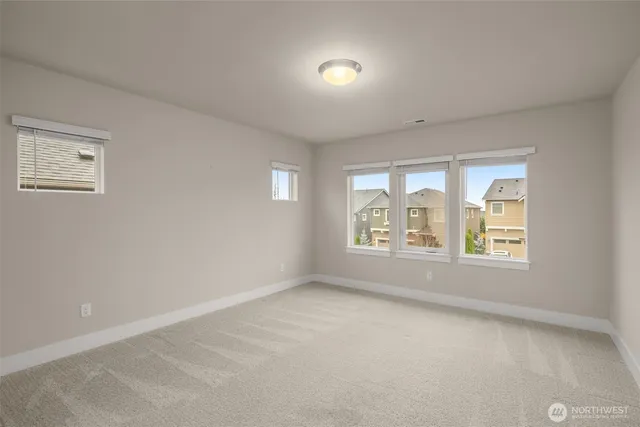 an empty room with a natural light