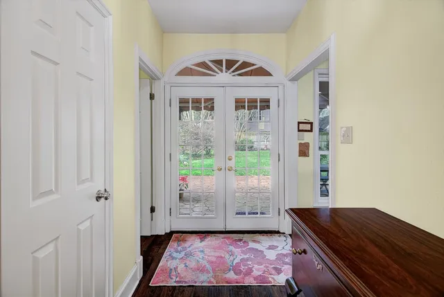 a spacious bedroom with a bed and a window