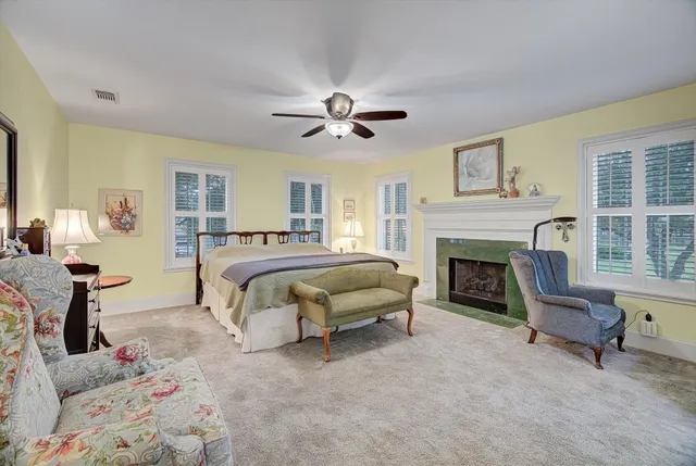 a bed room with a bed and a television