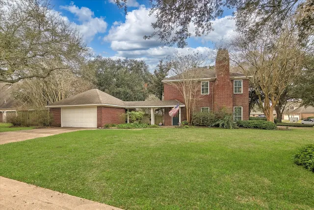 front view of a house with a big yard