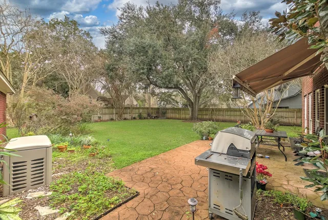 a view of backyard with seating space