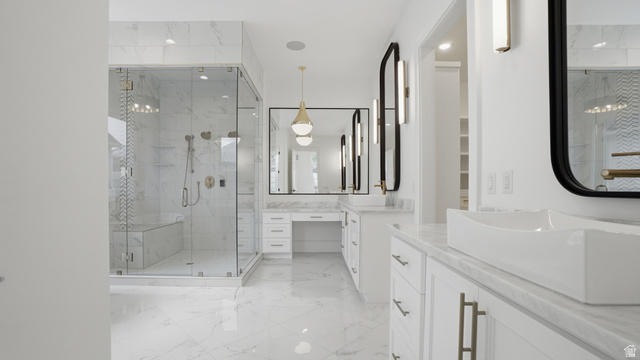 1682 North 1950 W Street, Unit 9 Provo, UT 84604 - Photo 30 of 84 Spacious bathroom featuring a frameless glass shower enclosure with bench seating, dual vanity with vessel sinks, white cabinetry, and large format tiled flooring