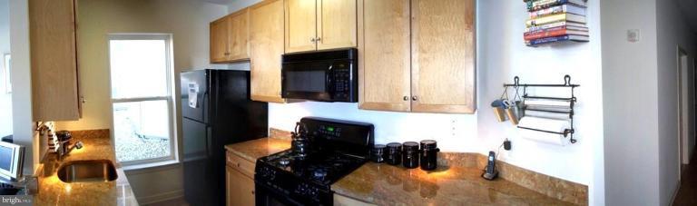 8045 Newell Street, Unit 111 Silver Spring, MD 20910 - Photo 5 of 16 Kitchen