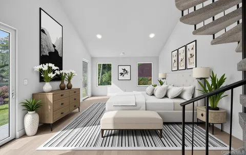 a view of an empty room with floor to ceiling windows