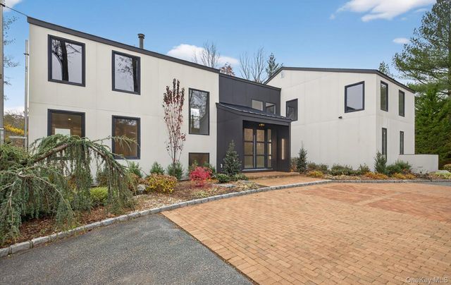 a front view of a house with street