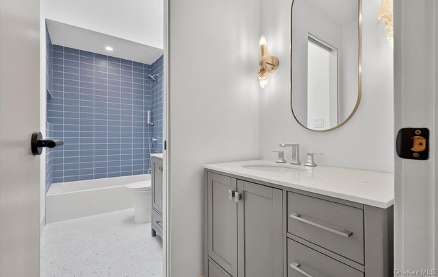 a view of room with wooden floor