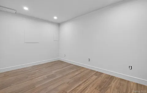 a view of a lake with a yard