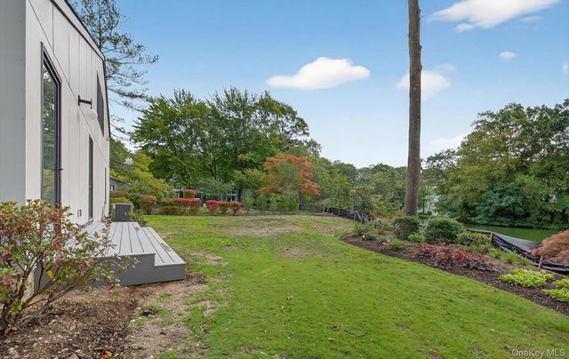 a view of outdoor space with deck and garden