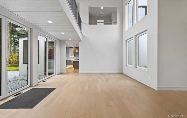 a view of an entryway with livingroom